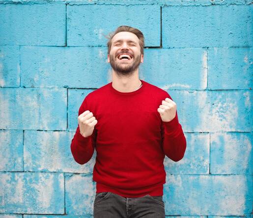 Happy man in red jumper